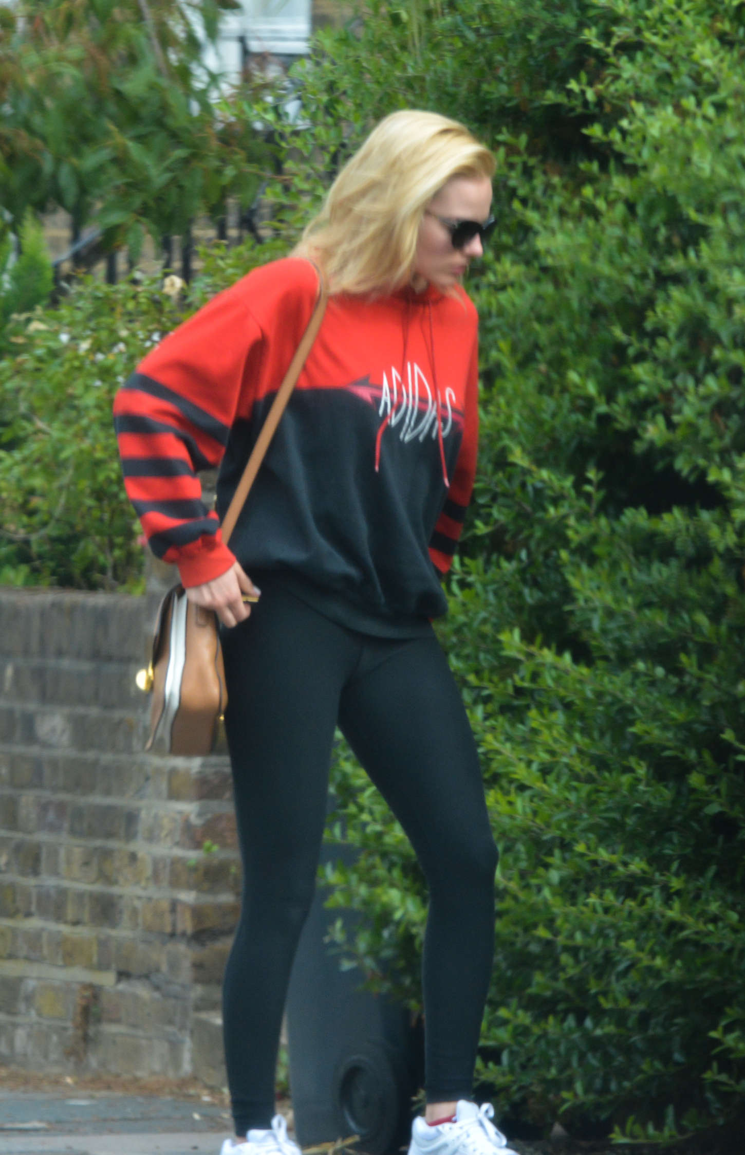 Margot Robbie in Tights Out and about in London. 