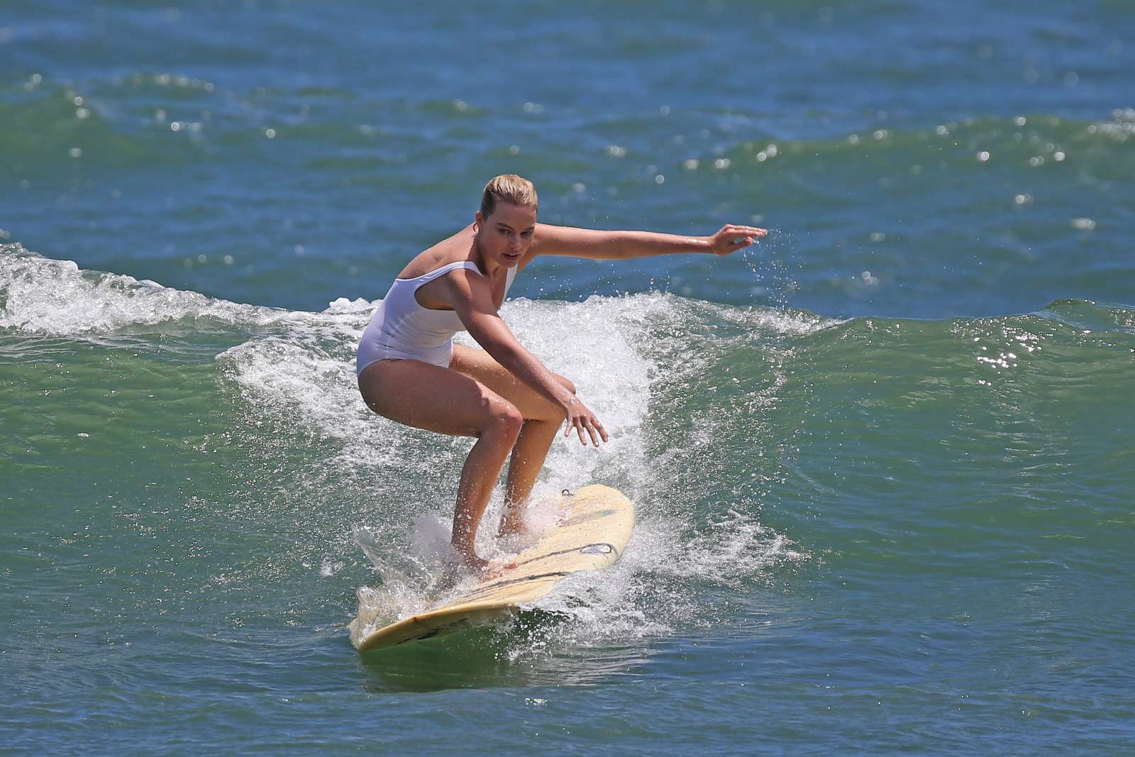 Margot Robbie in White Swimsuit in Hawaii. 