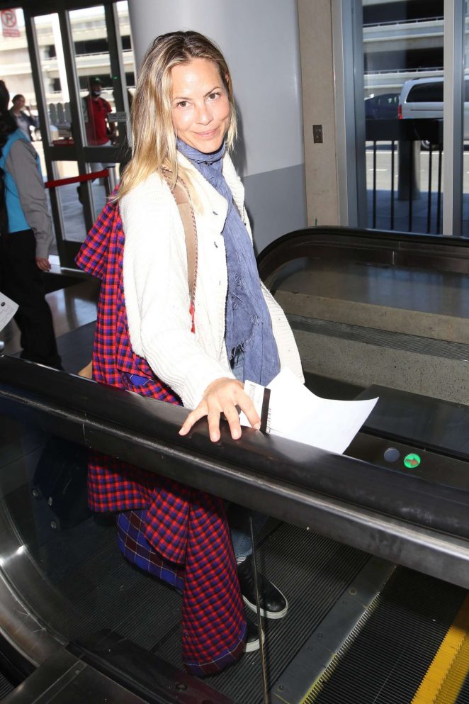 Maria Bello - Arrives at LAX Airport in Los Angeles