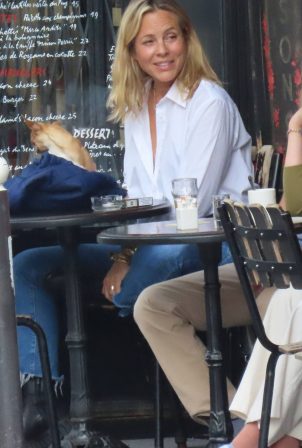 Maria Bello - With her dog out in Paris