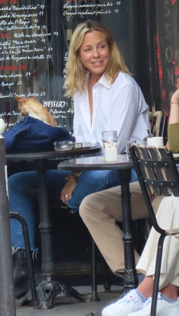 Maria Bello - With her dog out in Paris