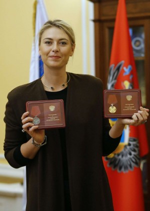 Maria Sharapova holds a Medal of the Order during a Ceremony to present State Awards in Moscow