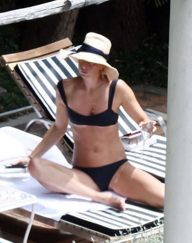 Maria Sharapova in Black Bikini at the pool in Positano