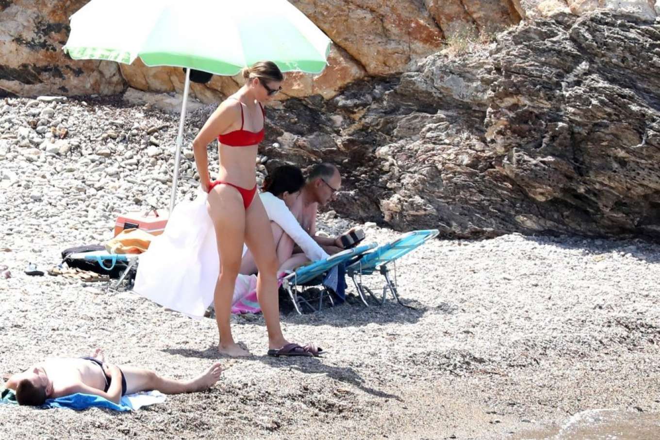 Maria Sharapova in Red Bikini on the beach in Isola dâ€™Elba