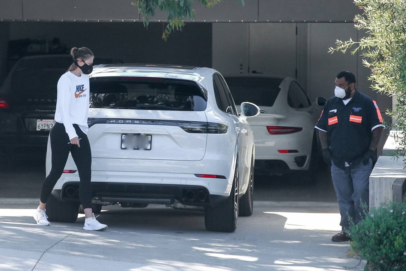Maria Sharapova â€“ Inspects her Porsche Cayenne after getting it delivered from the dealer