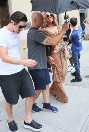 Mariah Carey - Seen with boyfriend Bryan Tanaka and her security in New Yor...