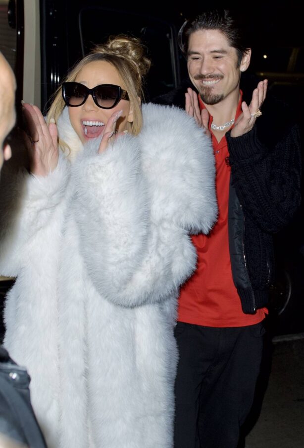 Mariah Carey - Wearing a Adrienne Landau coat while out in New York