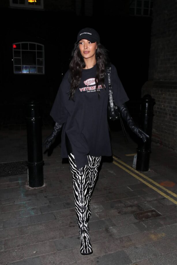 Maya Jama - In zebra print thigh high boots out in London