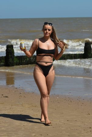 Megan Clark in Black Bikini on the beach in Frinton