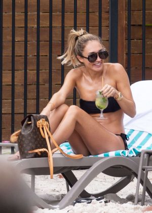 Megan McKenna in Black Bikini on the pool in Queensland