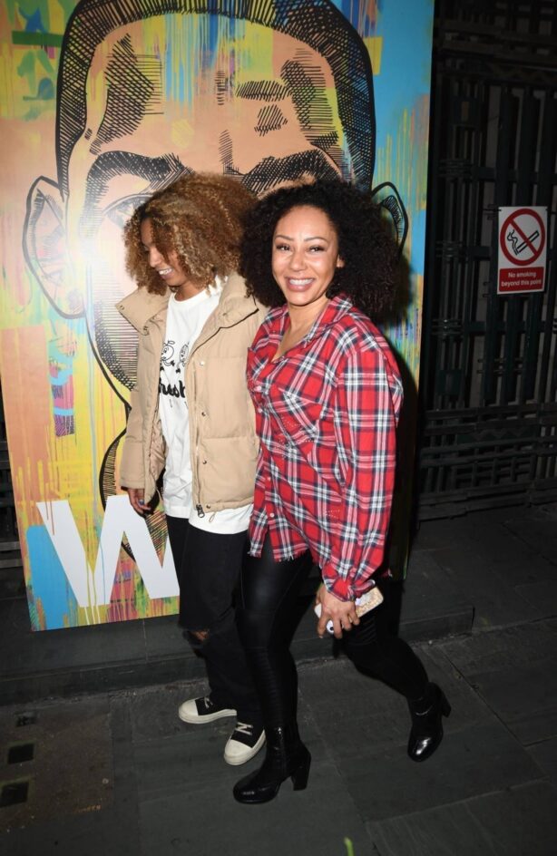 Melanie Brown - Waits on the steps next to the Savoy Theatre in London to see Will Smith