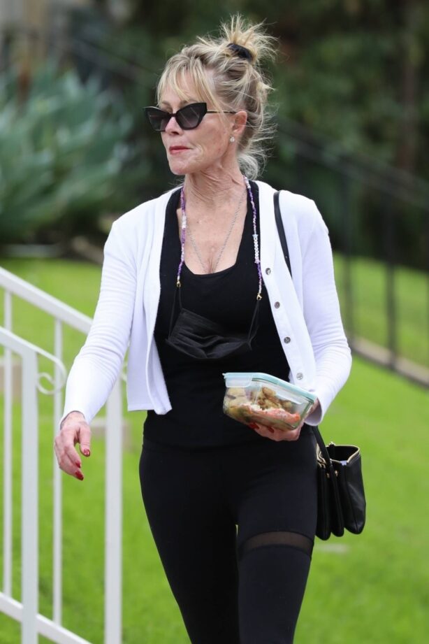Melanie Griffith - Stops by a friend's place in Los Angeles