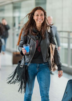 Melanie Sykes - Arrives at Heathrow Airport in London