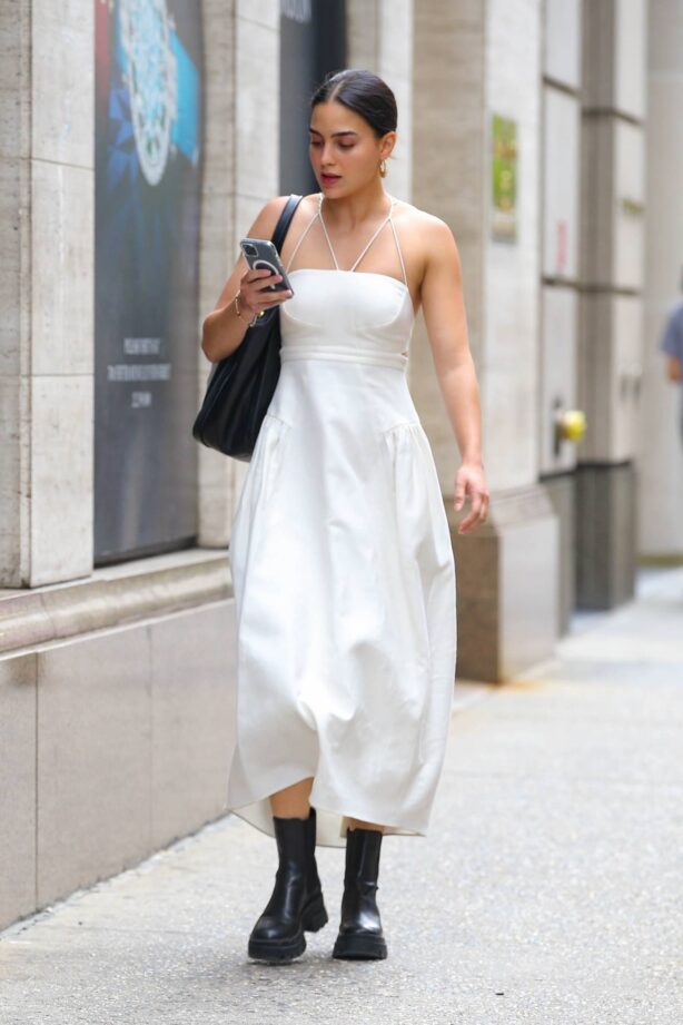 Melissa Barrera - In a white dress and black leather boots out New York