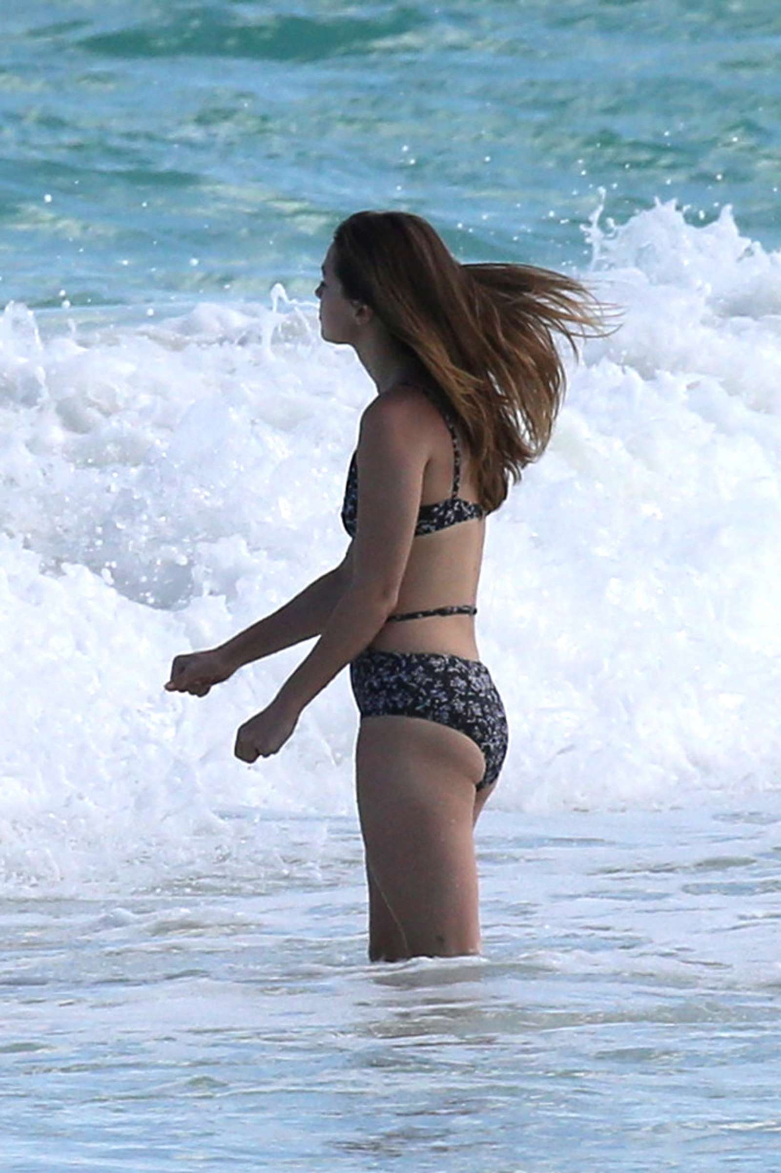 Melissa Benoist in Bikini on the beach in Mexico. 