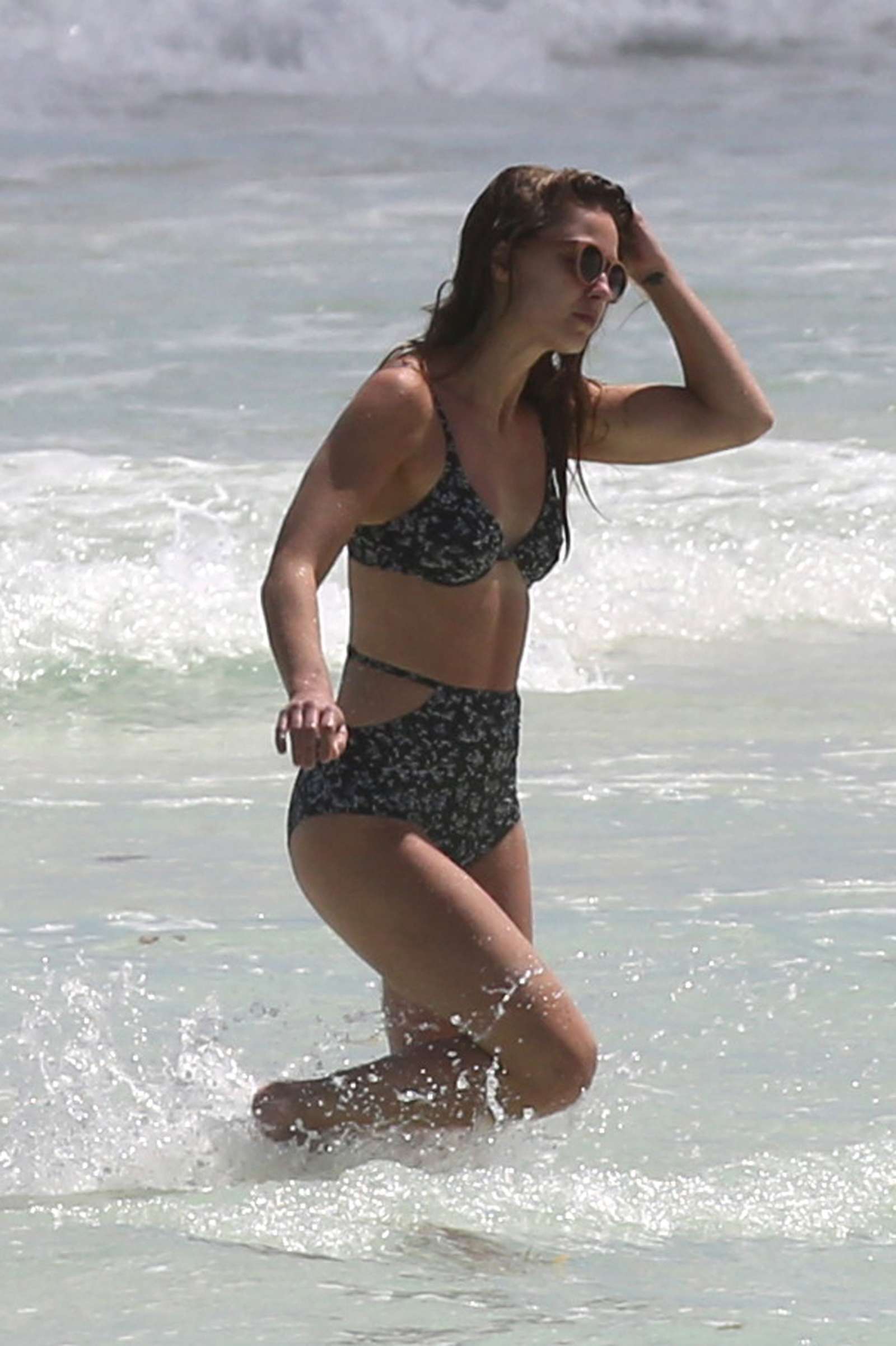 Melissa Benoist in Bikini on the beach in Mexico. 