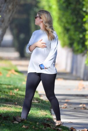 Mia Goth - Is seen taking walk in their neighborhood in Pasadena