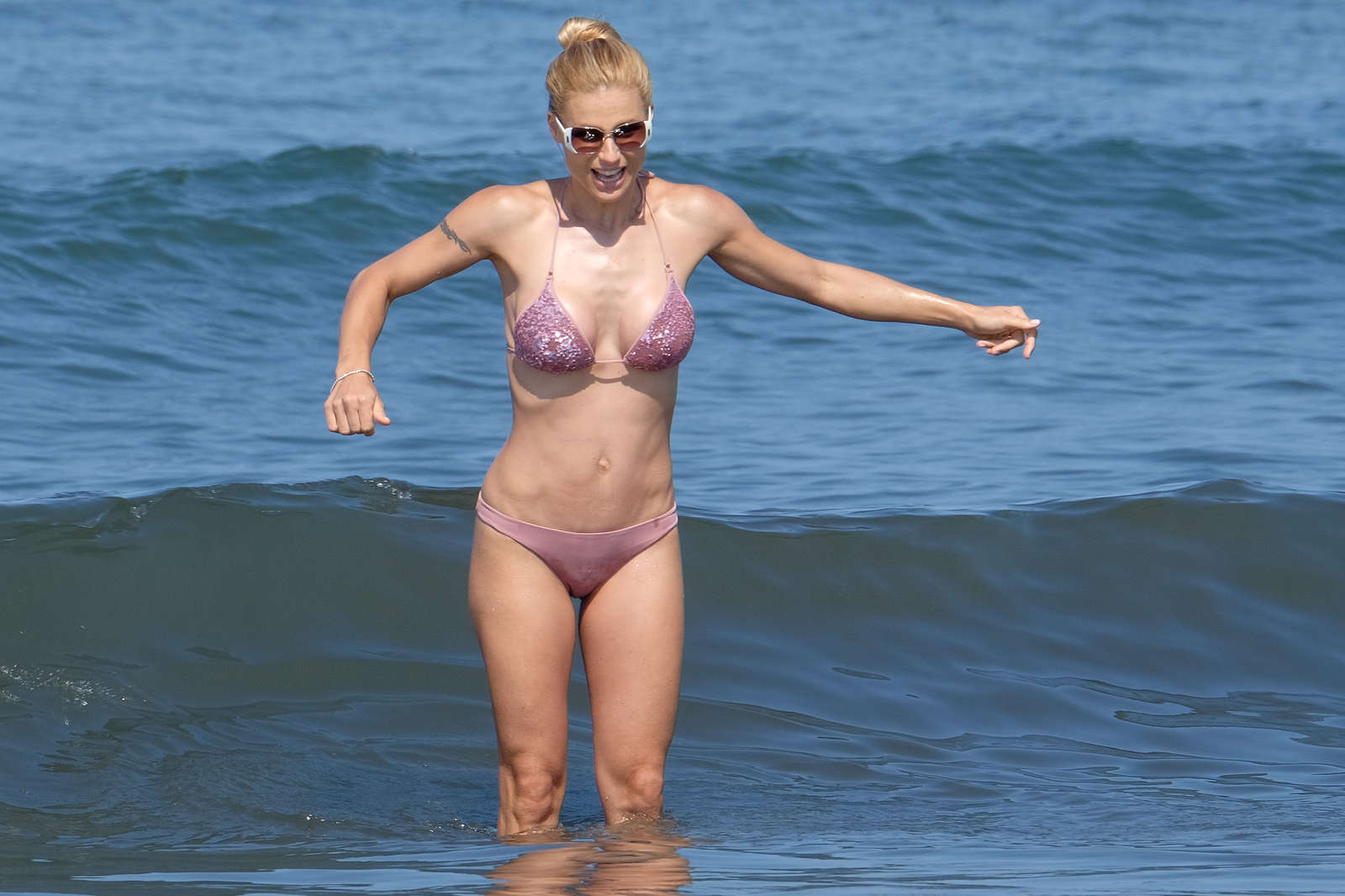 Michelle Hunziker - Bikini Candids in Italy. 