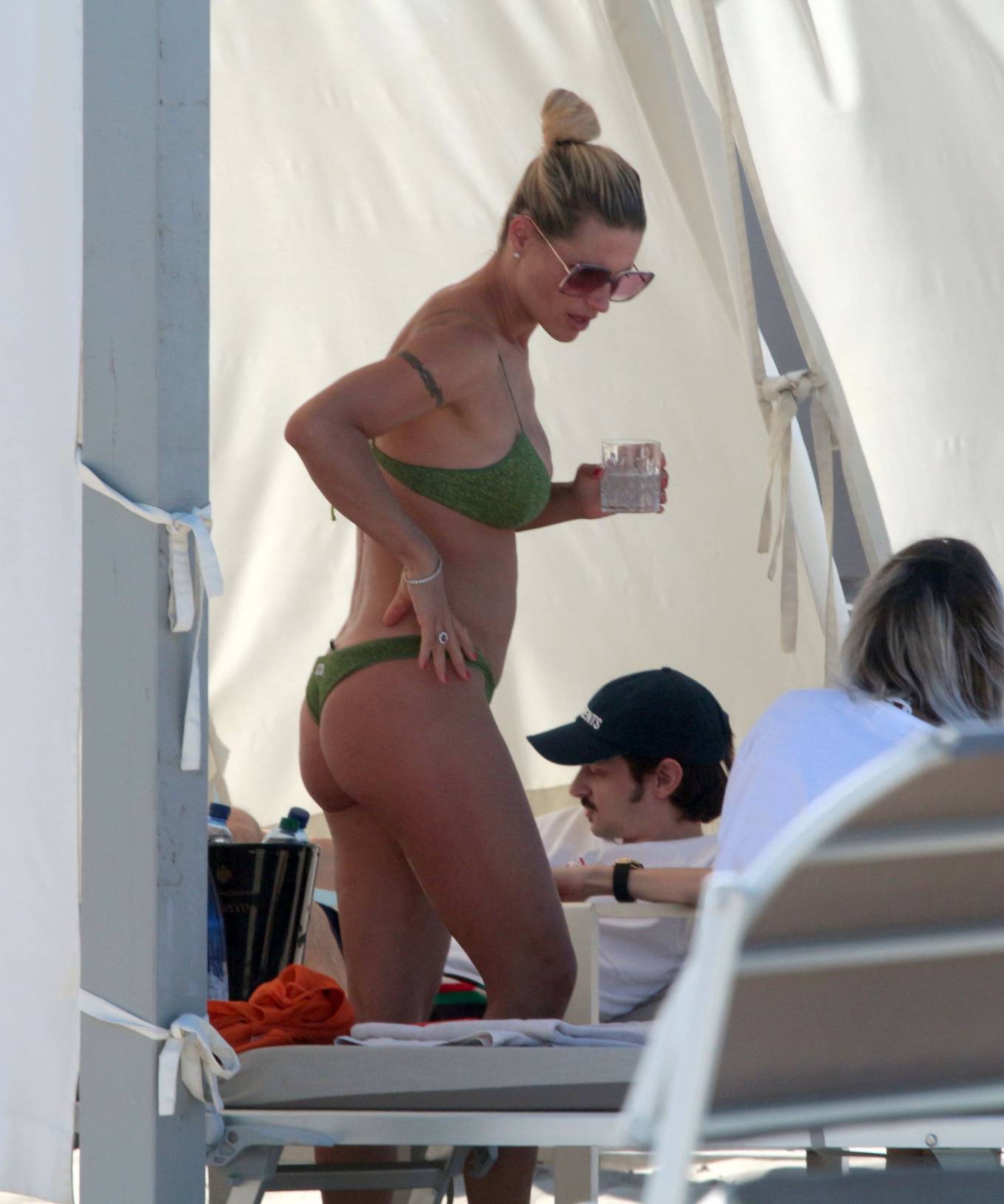 https://www.gotceleb.com/wp-content/uploads/photos/michelle-hunziker/in-green-bikini-on-vacation-in-milano-marittima/Michelle-Hunziker-in-Green-Bikini-2020-21.jpg