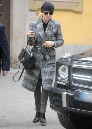Michelle Hunziker in grey trench coat out in Milan