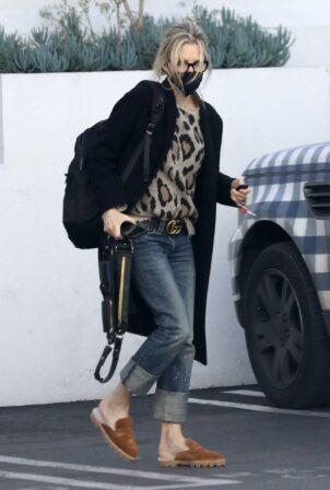 Michelle Pfeiffer - In a leopard sweater with a Gucci belt in Santa Monica