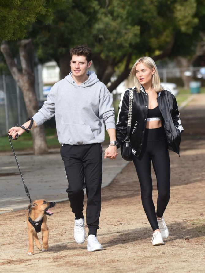 Michelle Randolph and Gregg Sulkin at a park walking their pupp in Los Angeles
