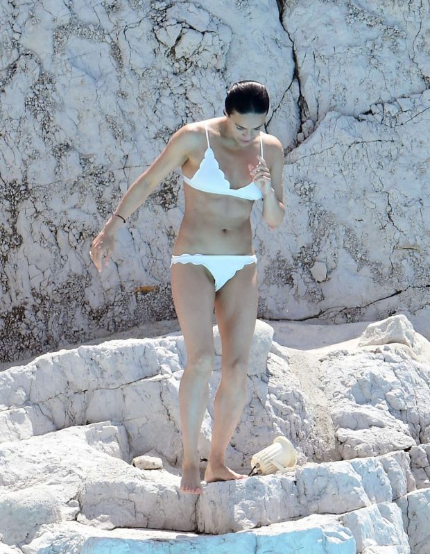 Michelle Rodriguez in White Bikini at a pool at the Hotel Du Cap-Eden-Roc hotel in Cannes