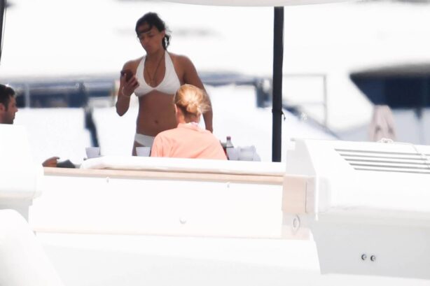 Michelle Rodriguez - In white bikini on holidays on a yacht in Porto Cervo