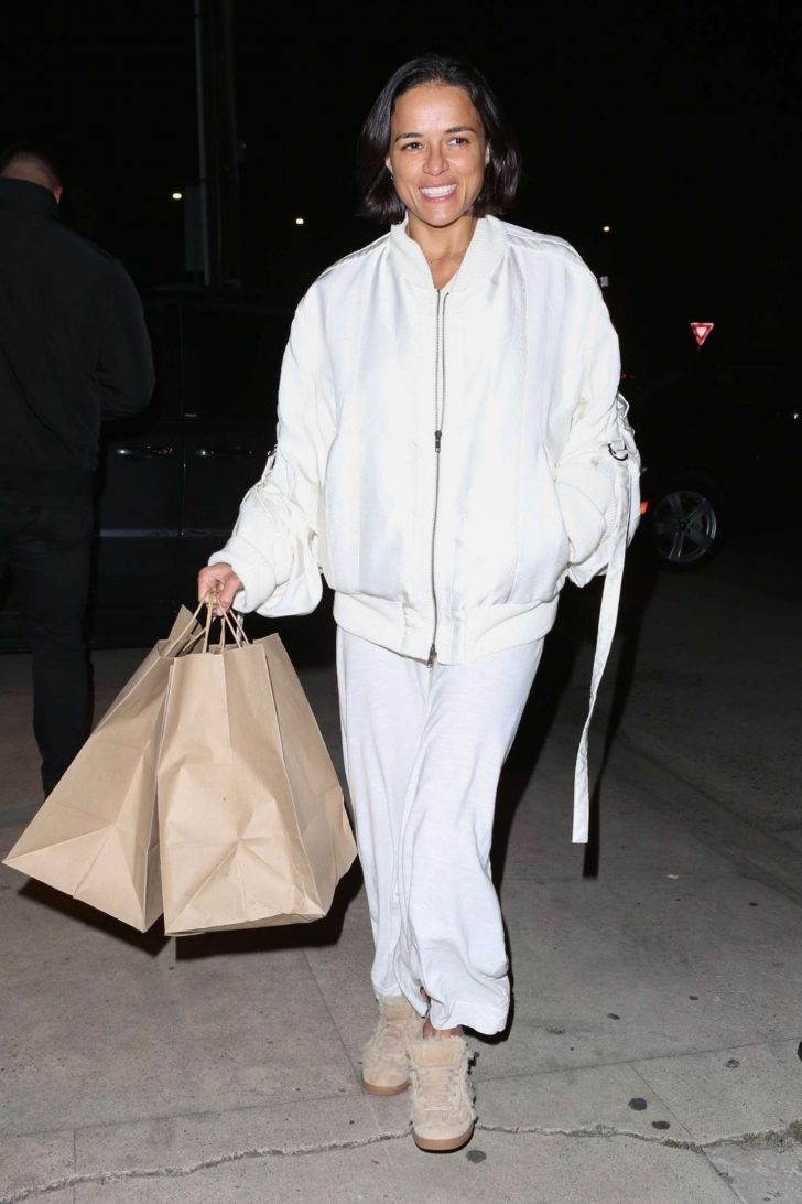 Michelle Rodriguez in White Coat and Dress at Giorgio Baldi in Santa Monica