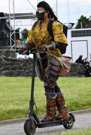 Michelle Rodriguez - Travels around on a scooter at Carrickfergus Castle in Ireland