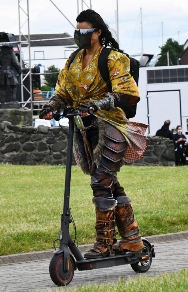 Michelle Rodriguez - Travels around on a scooter at Carrickfergus Castle in Ireland