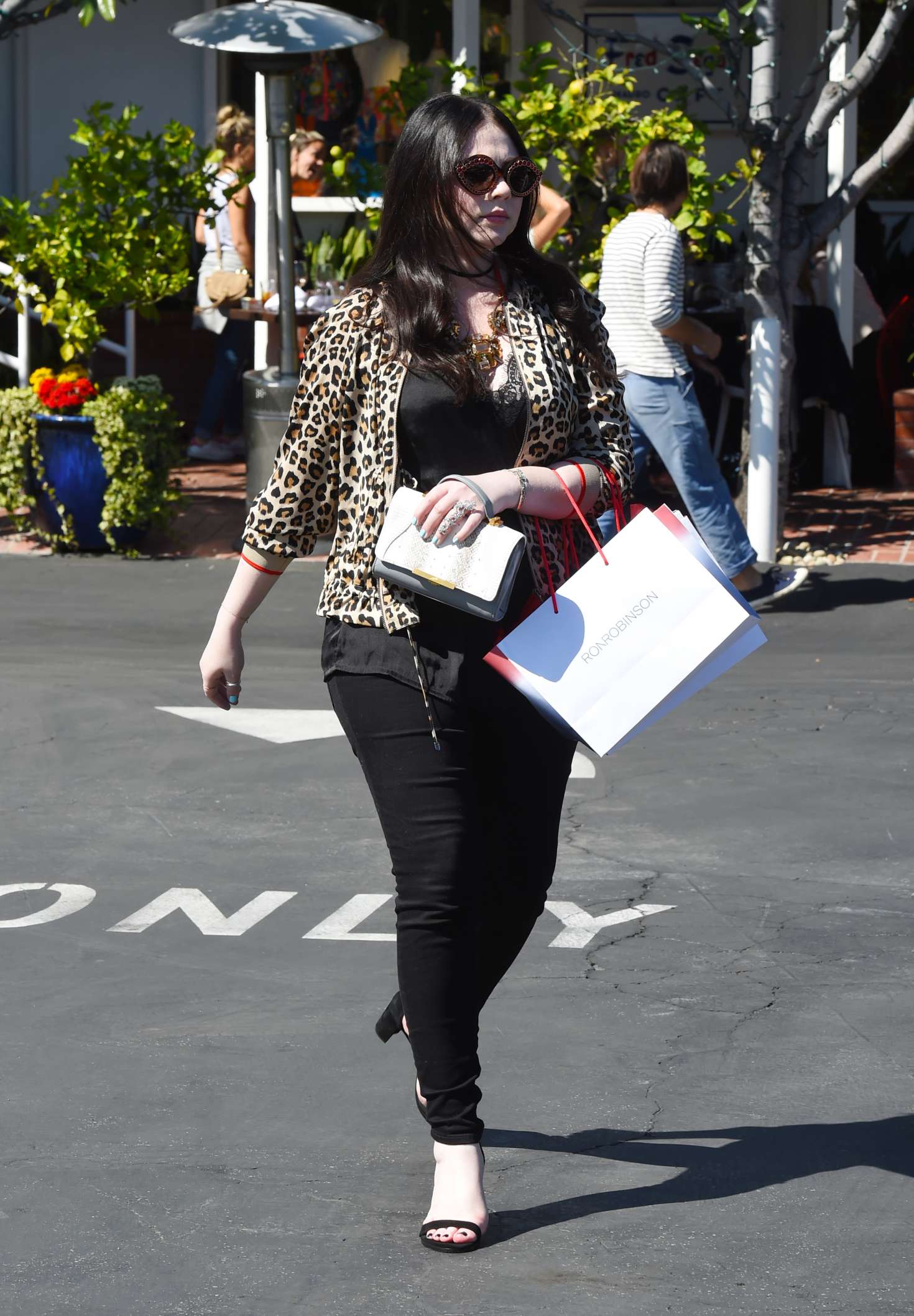 Michelle Trachtenberg in a leopard print jacket at Fred Segal in LA