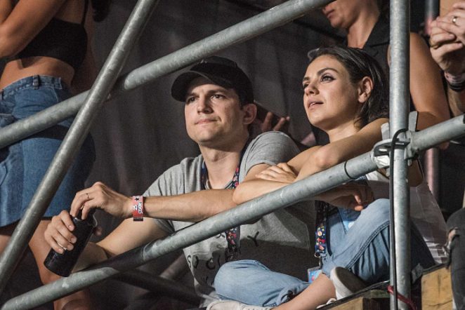 Mila Kunis and Ashton Kutcher at the Wiz Khalifa concert in Budapeste