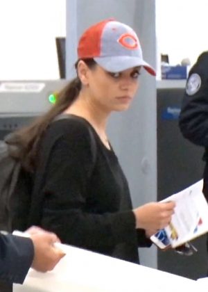Mila Kunis - Arrives at LAX Airport in Los Angeles