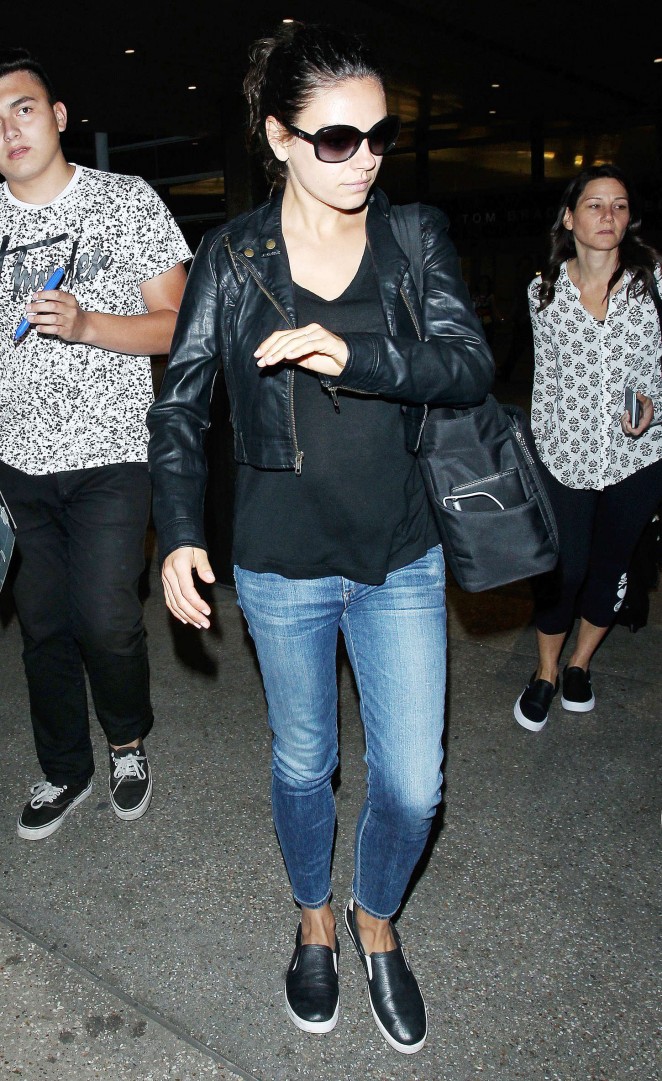 Mila Kunis in Jeans at LAX Airport in LA
