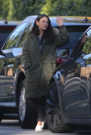 Mila Kunis - Out in olive green puffer jacket in Beverly Hills