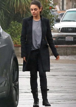 Mila Kunis out in the rain in Studio City