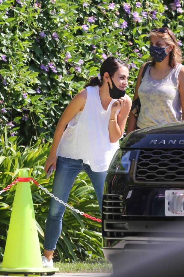 Mila Kunis - Pick up her kids after swim class in Los Angeles