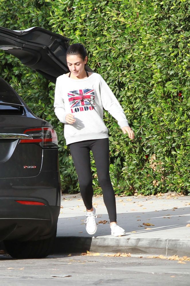Mila Kunis - Wearing a Sweater and Tights in Los Angeles