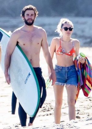 Miley Cyrus and Liam Hemsworth at the beach in Malibu