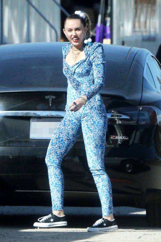 Miley Cyrus in Blue Floral Jumpsuit - On set of her latest project in Los Angeles