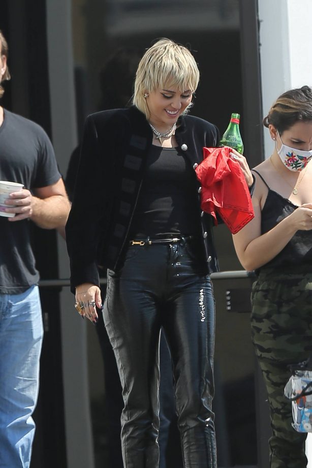 Miley Cyrus - In leather pants out in Los Angeles