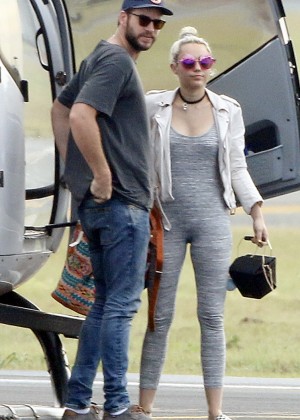 Miley Cyrus in Tight Suit at Airport in Brisbane