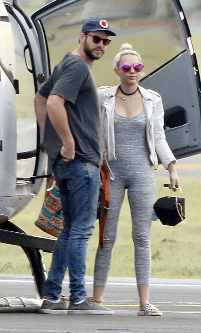 Miley Cyrus in Tight Suit at Airport in Brisbane