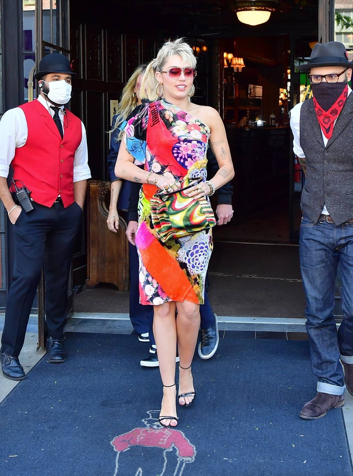 Miley Cyrus - Out in retro 70s rocker dress with mom Tish in New York