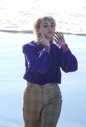 Miley Cyrus - Pictured while shooting a new music video in Malibu