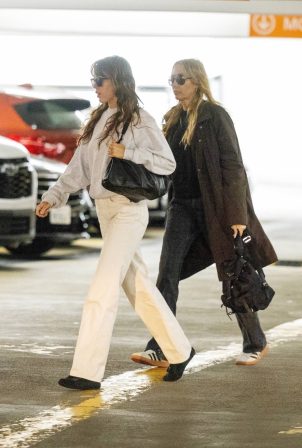 Miley Cyrus - With mom Tish seen heading to a business meeting