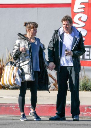 Milla Jovovich and Paul Anderson - Leaving the gym in Los Angeles