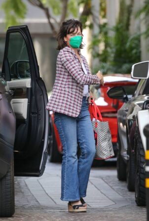 Milla Jovovich - Heads to lunch at Beverly Wilshire Hotel in Beverly Hills