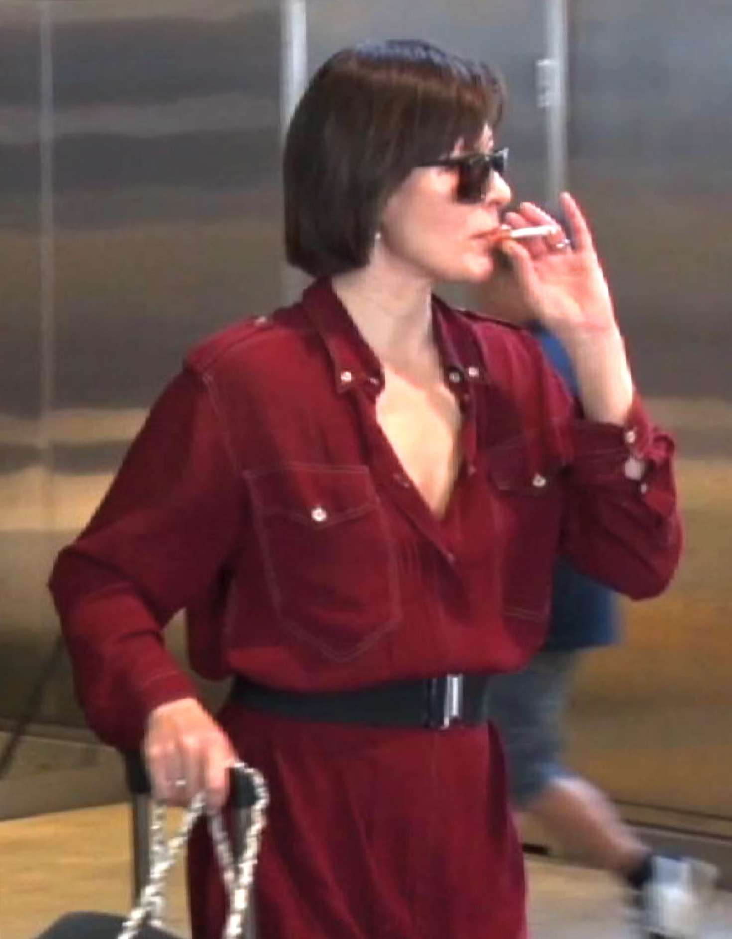 Milla Jovovich 2017 : Milla Jovovich in Red Dress at LAX Airport -06. 